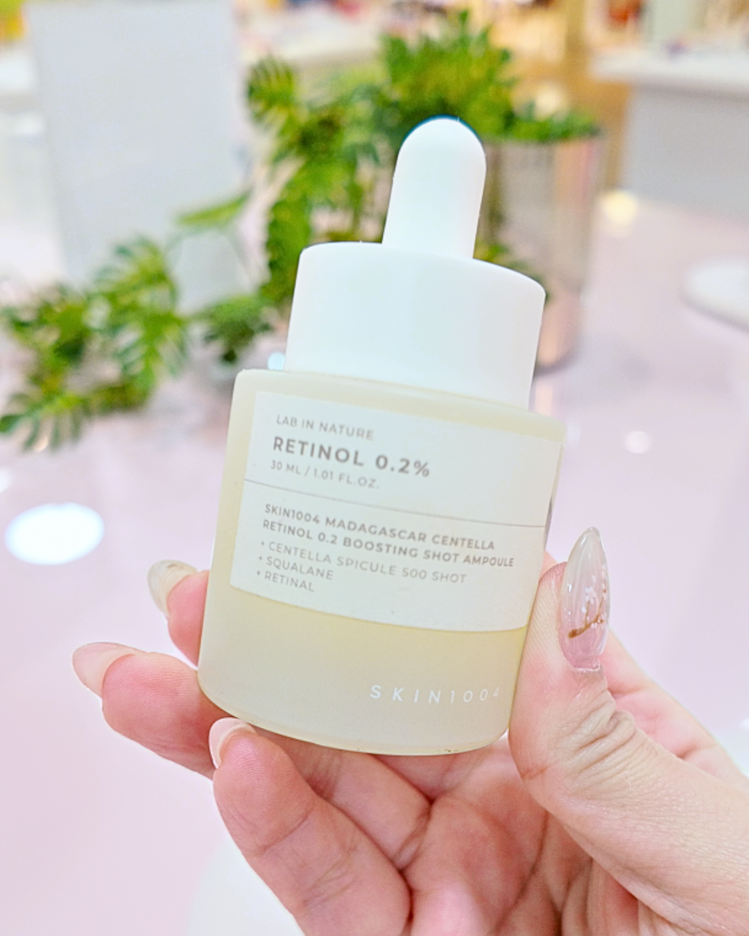Skin1004 retinol niacinamide and matrixyl serum lineup on pink surface for dry skin routine