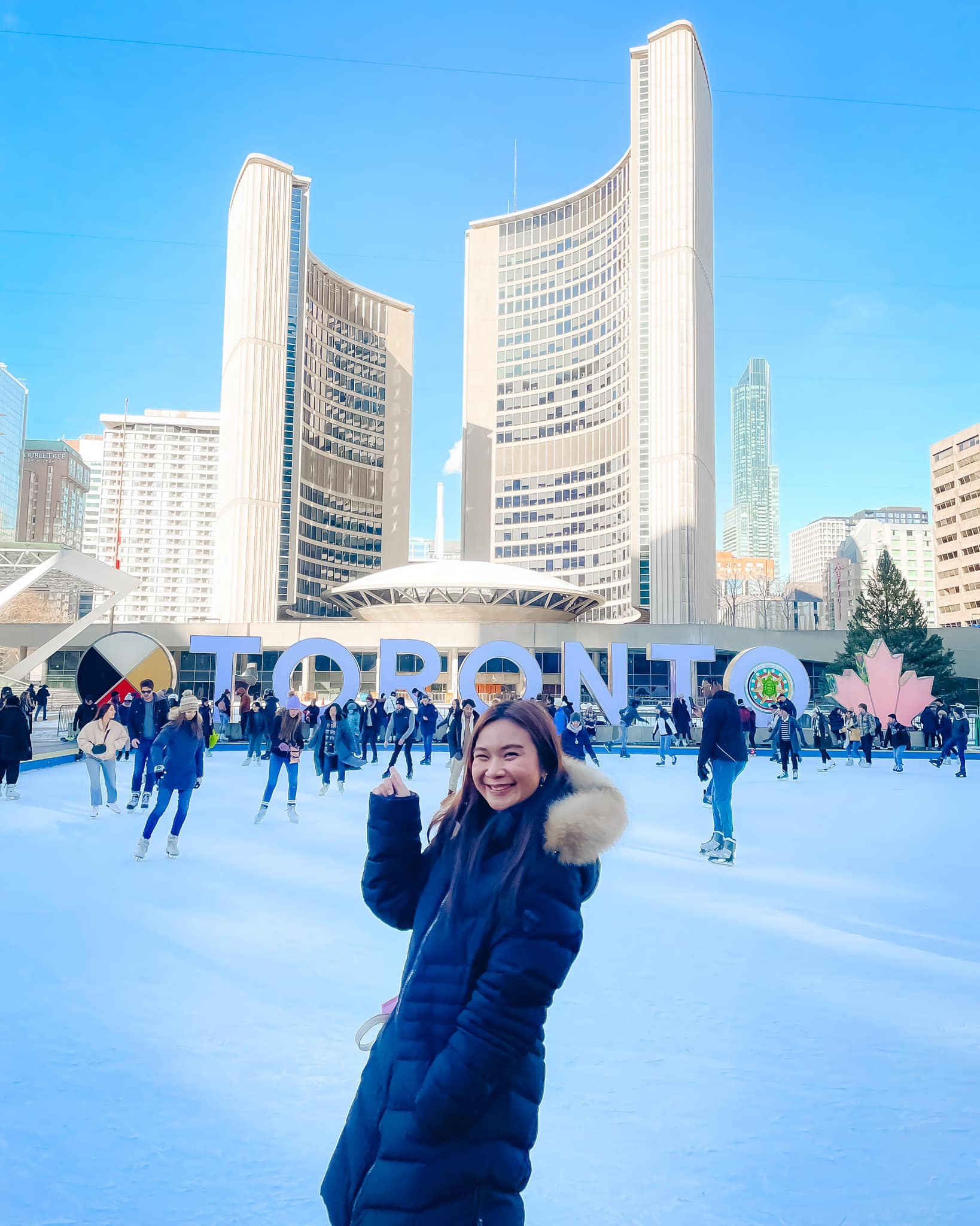An obligatory photo in front of the Toronto sign at Nathan Phillips Square 