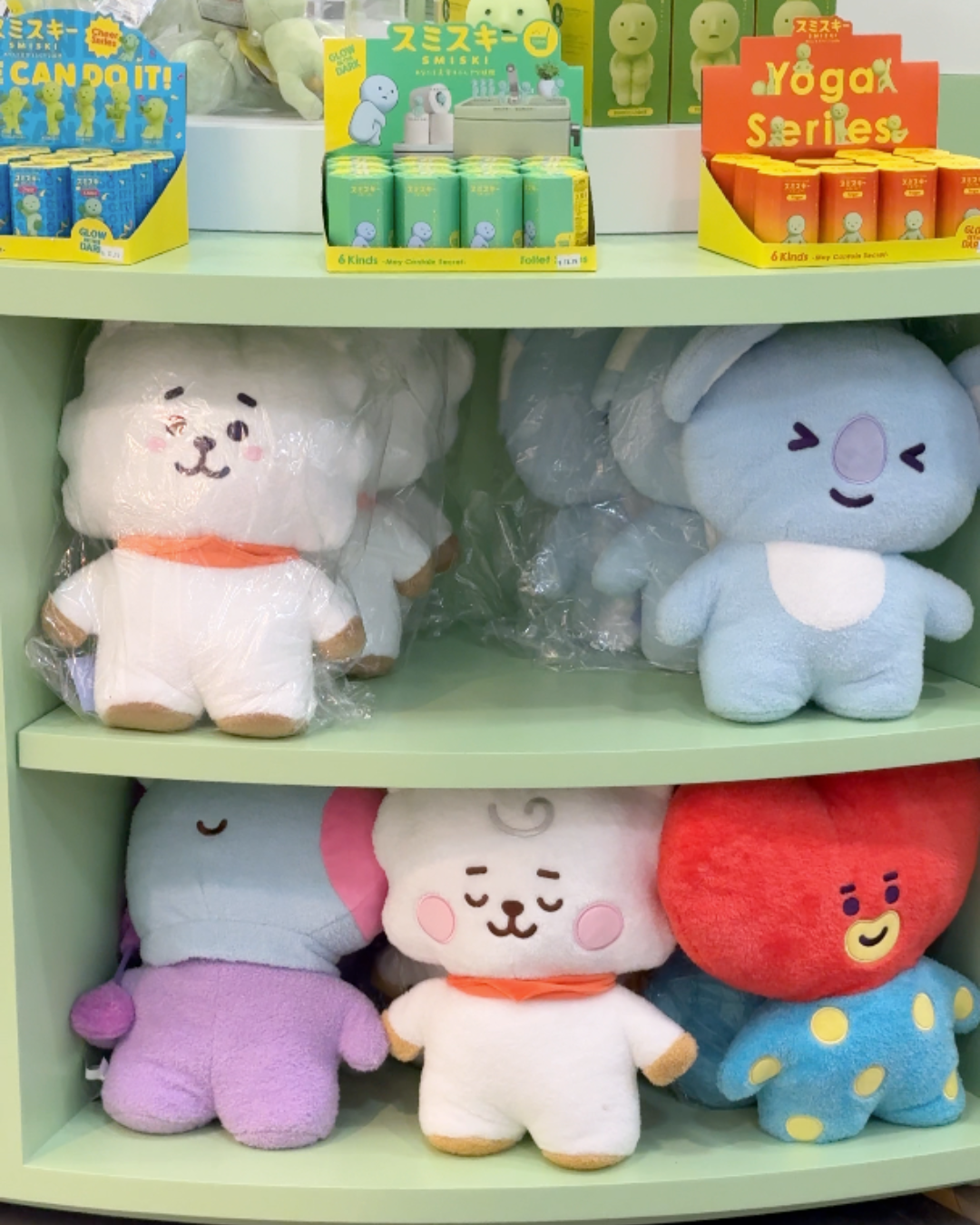 BT21 plushies and Smiski blind boxes on shelves at Sukoshi Mart Toronto kpop and kbeauty store