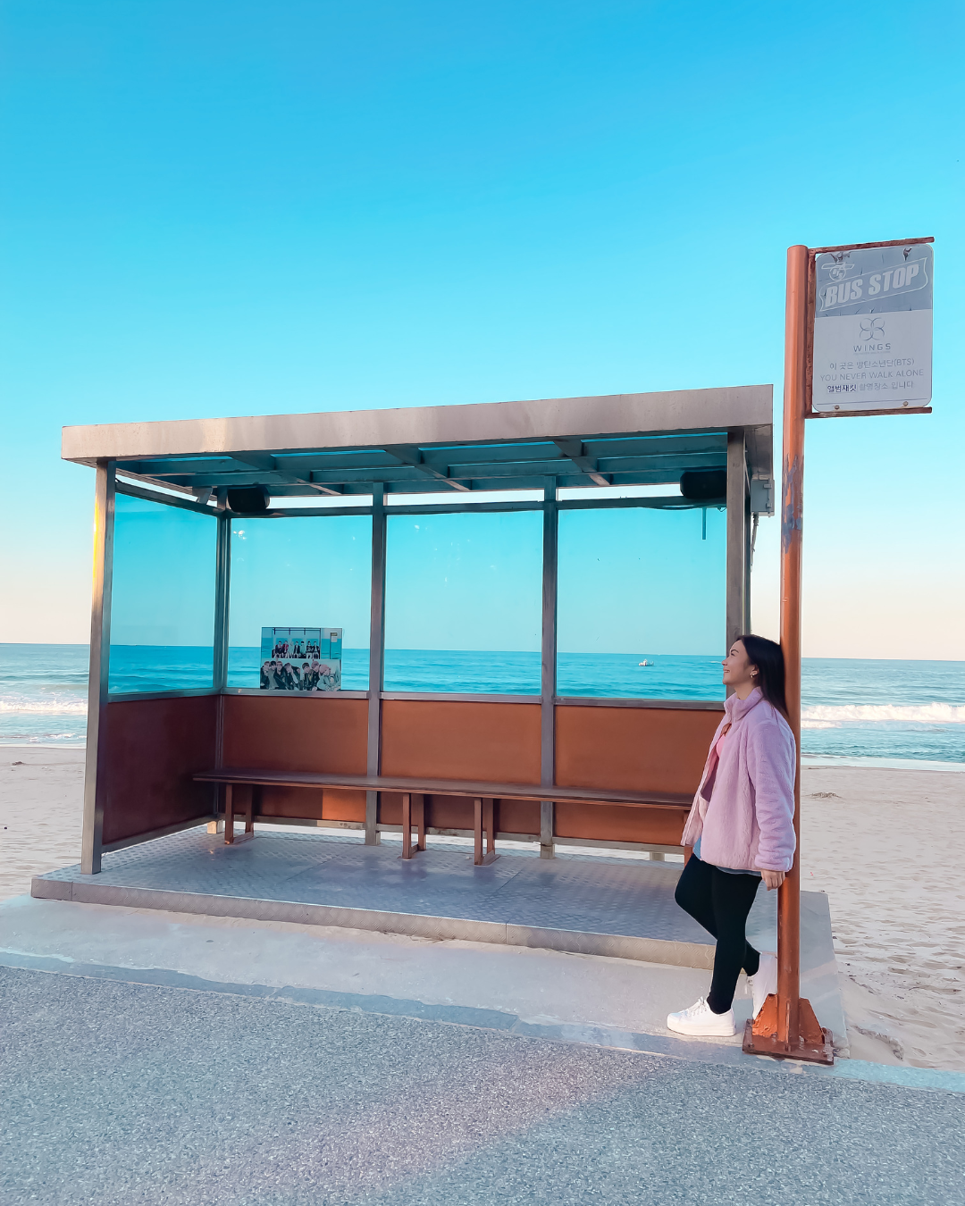 Roxanne Lacap at the BTS Spring Day bus stop at Hyangho Beach in Jumunjin Gangneung South Korea