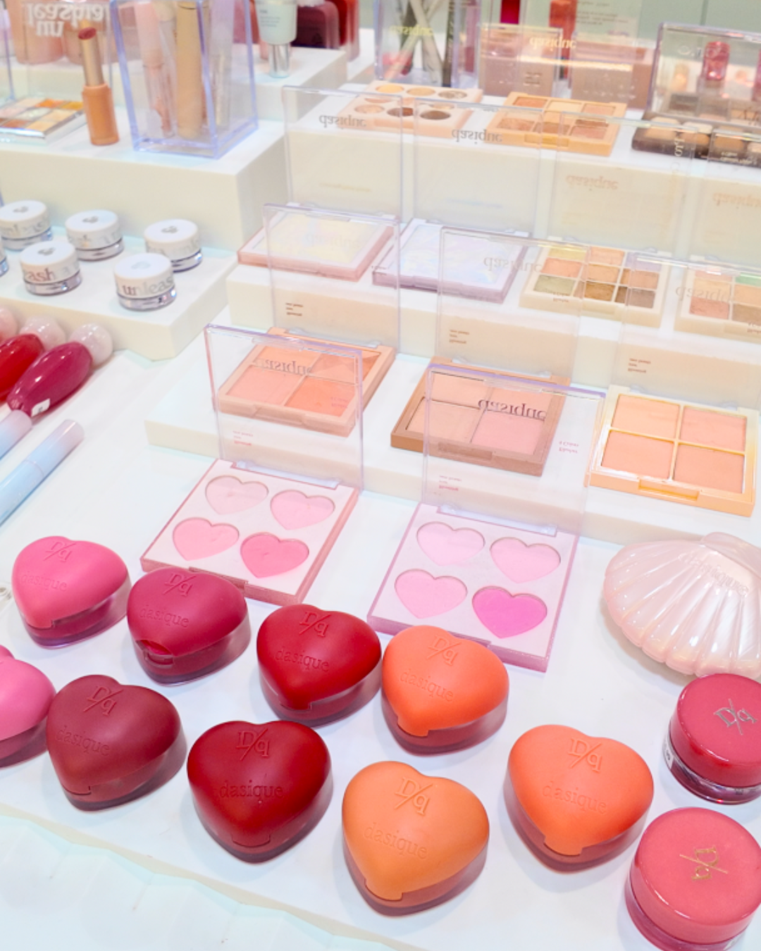 Dasique heart shaped blush and eyeshadow palettes displayed at Sukoshi Mart kbeauty makeup store Toronto