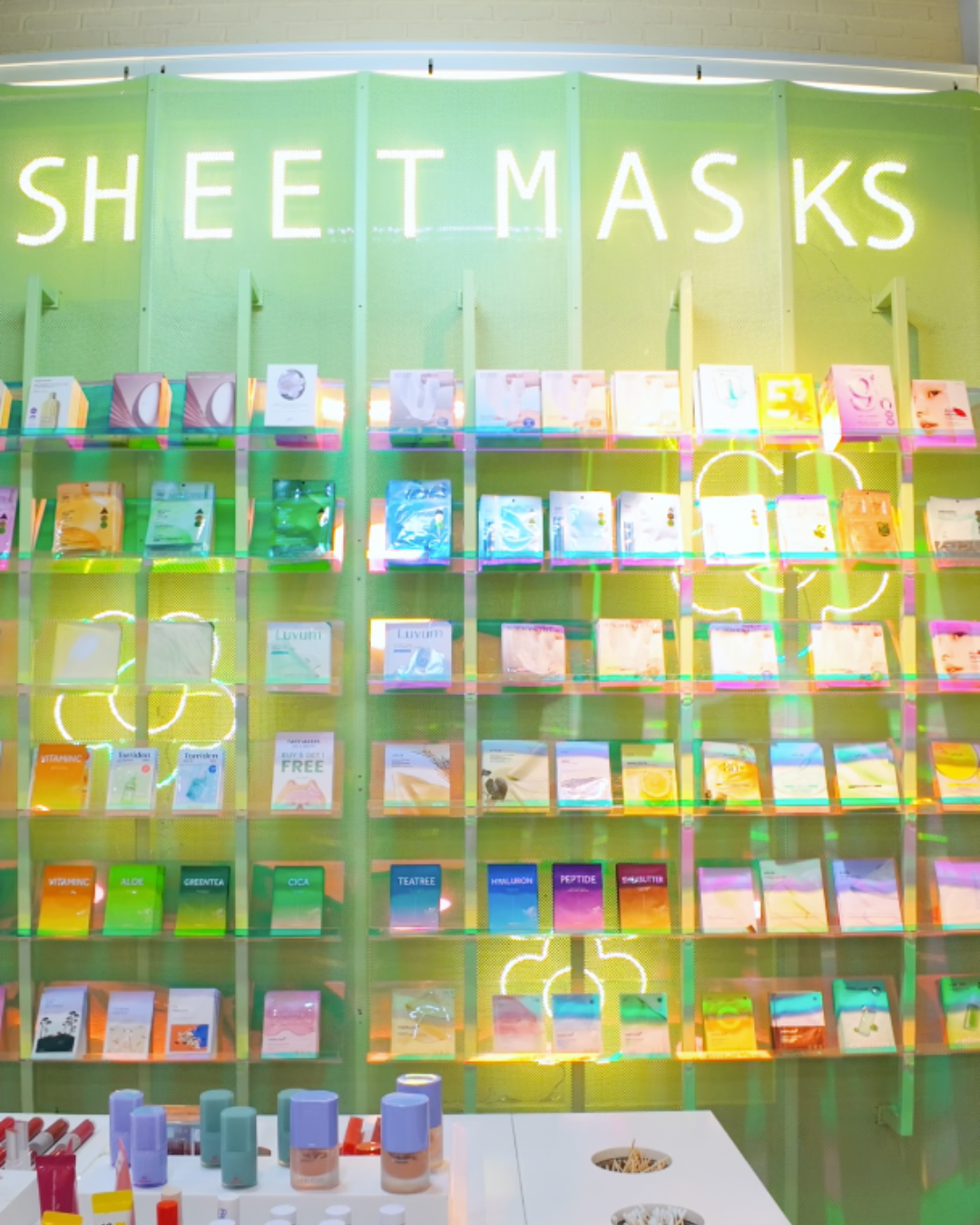 Large wall display of kbeauty sheet masks at Sukoshi Mart skincare store Toronto